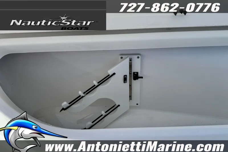 Slide: The Image of 2026 NauticStar 251 Hybrid boat interior with rod holder, Antonietti Marine branding. - 12
