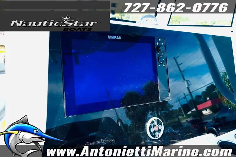 Slide: The Image of 2026 NauticStar 251 Hybrid boat dashboard with Simrad display, Antonietti Marine branding. - 23