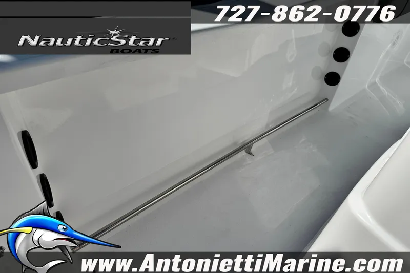 Slide: The Image of 2026 NauticStar 251 Hybrid boat interior with logo and contact details. - 26