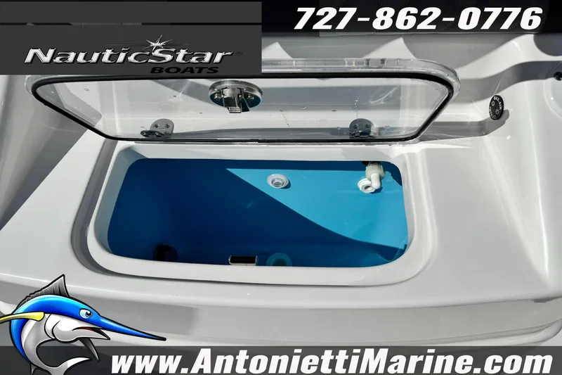 Slide: The Image of 2026 NauticStar 251 Hybrid boat livewell with open lid, showcasing interior features. - 27