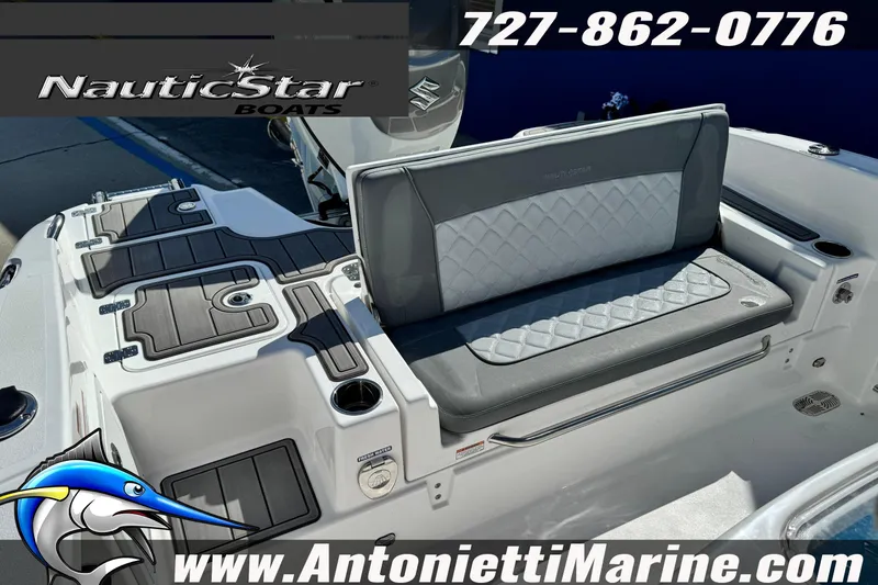 Slide: The Image of 2026 NauticStar 251 Hybrid boat interior with cushioned seating and sleek design. - 29