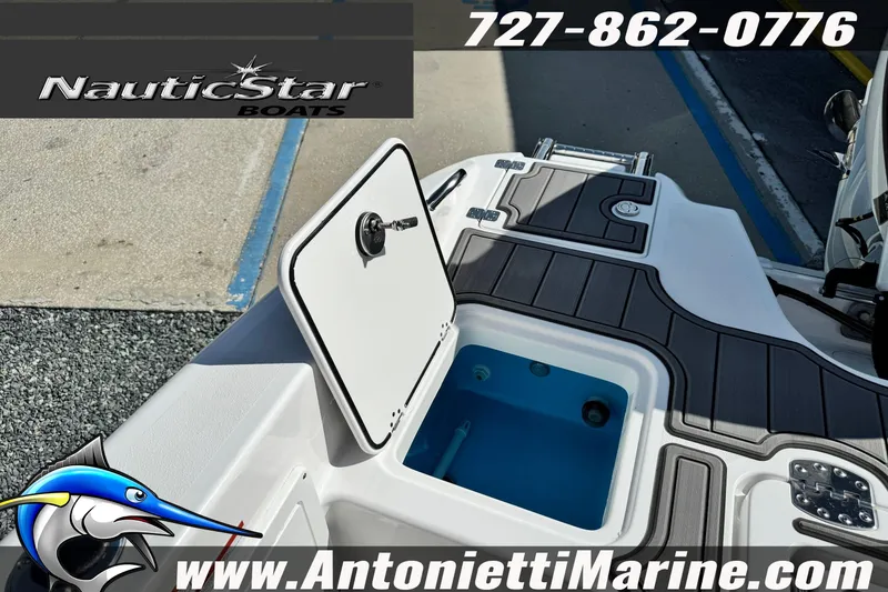 Slide: The Image of 2026 NauticStar 251 Hybrid boat deck with storage compartment open, displayed at Antonietti Marine. - 30