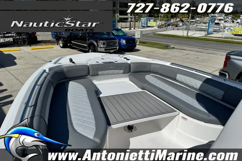 Slide: The Image of 2026 NauticStar 251 Hybrid boat interior with seating and table, displayed at Antonietti Marine. - 39