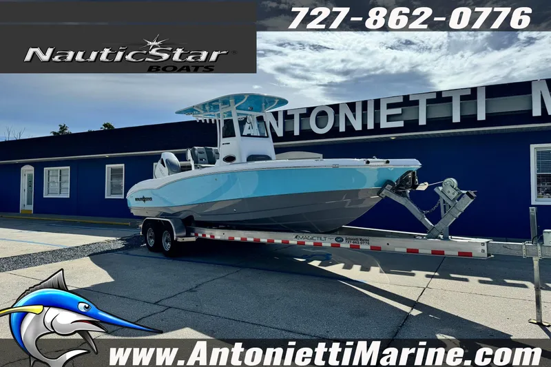 Slide: The Image of 2026 NauticStar 251 Hybrid boat on trailer at Antonietti Marine dealership. - 43