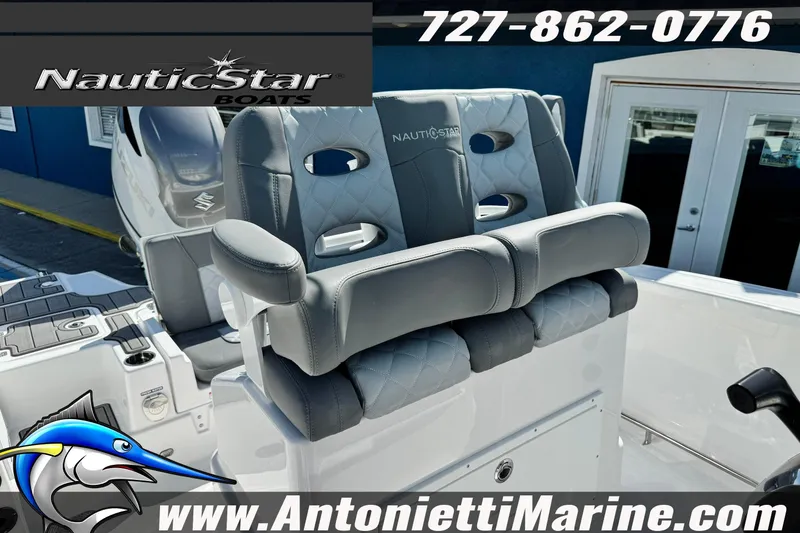 Slide: The Image of 2026 NauticStar 251 Hybrid boat seating, featuring premium gray upholstery and logo branding. - 9