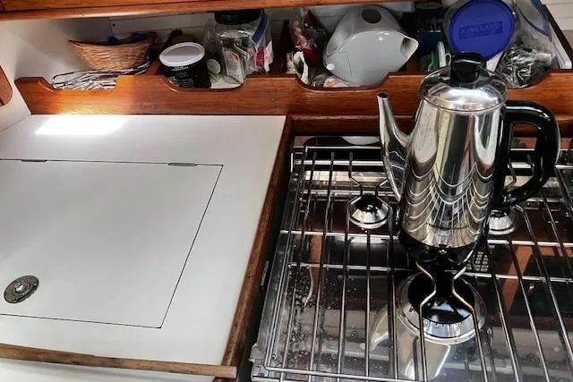 Slide: The Image of Galley kitchen in 1992 Catalina 42' MkII yacht with stove and coffee pot. - 10