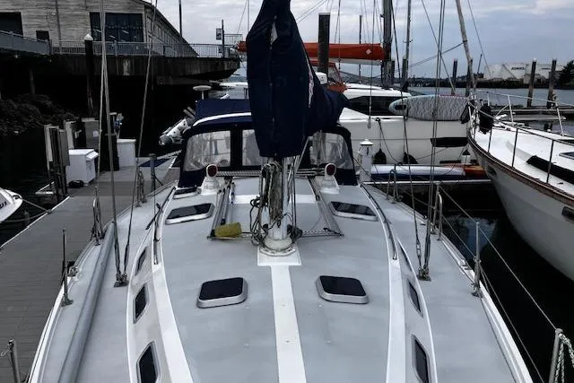 Slide: The Image of Sailboat docked at marina, Catalina 42' MkII, 1992 model, overcast sky. - 5