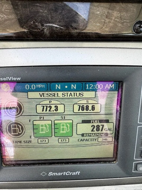 Slide: The Image of 2010 Sea Ray 470 Sundancer on calm waters. - 11