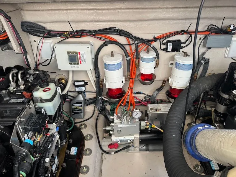 Slide: The Image of Engine room of 2010 Sea Ray 470 Sundancer with technical components. - 45