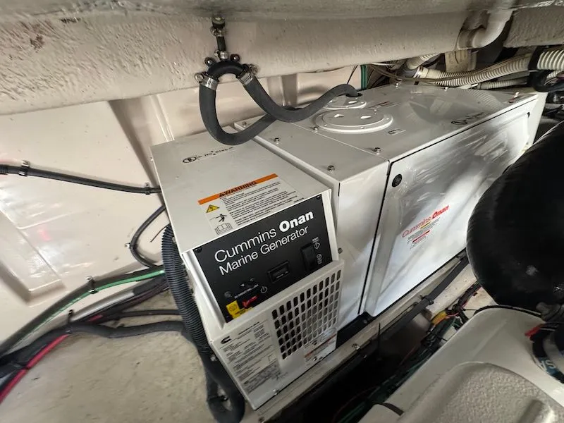 Slide: The Image of Cummins Onan Marine Generator in a 2010 Sea Ray 470 Sundancer. - 47