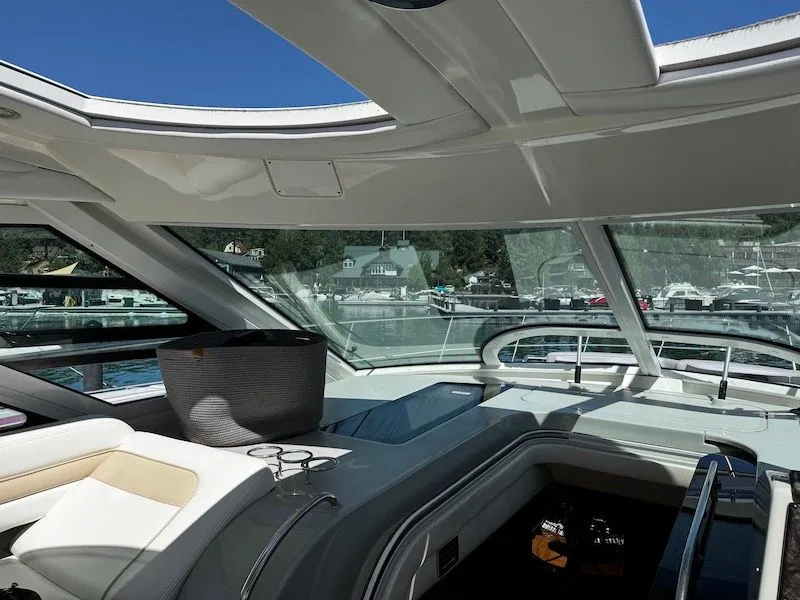 Slide: The Image of 2010 Sea Ray 470 Sundancer on calm waters. - 7