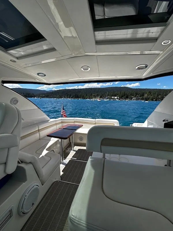 Slide: The Image of 2010 Sea Ray 470 Sundancer yacht on the water. - 9