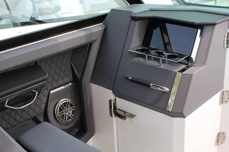 Slide: The Image of Interior of 2025 Cobalt R33 boat with sleek design and modern amenities. - 13