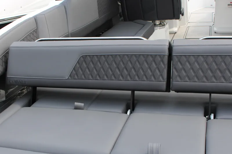 Slide: The Image of Luxurious seating in 2025 Cobalt R33 boat with diamond-stitched upholstery. - 19