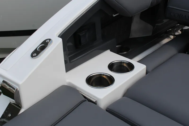 Slide: The Image of Interior of 2025 Cobalt R33 boat with cup holders and sleek seating. - 25