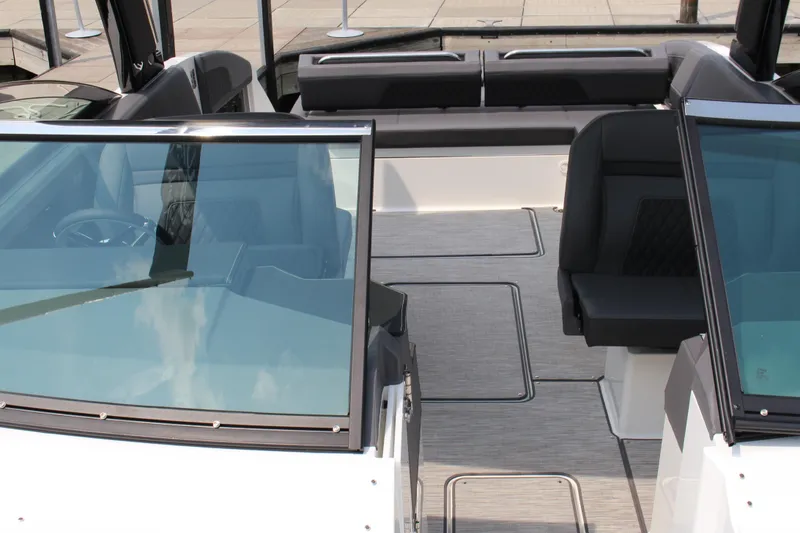 Slide: The Image of 2025 Cobalt R33 boat interior with sleek seating and modern design. - 32