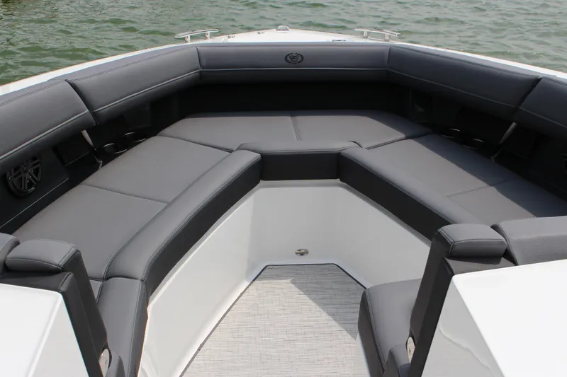 Slide: The Image of Luxurious seating area on 2025 Cobalt R33 boat, featuring sleek gray upholstery. - 46