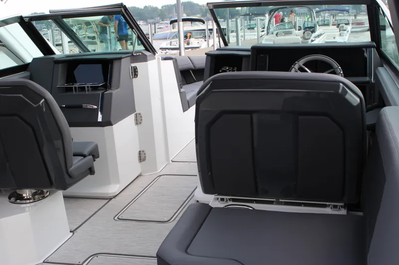 Slide: The Image of Interior of 2025 Cobalt R33 boat with modern seating and dashboard design. - 6