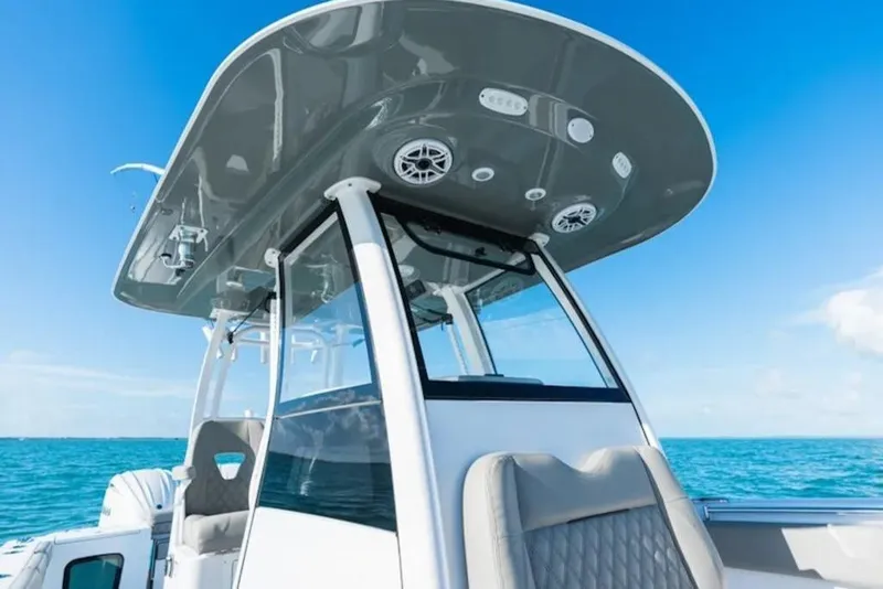 Slide: The Image of 2026 Sportsman Open 282 boat with sleek design on open water. - 8