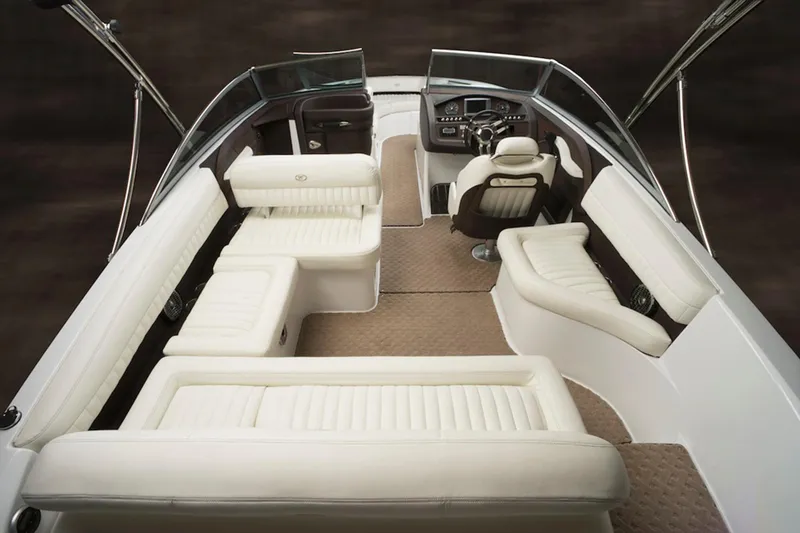 Slide: The Image of Manufacturer Provided Image: 2014 Cobalt R5 boat interior with luxurious white seating and modern dashboard. - 4
