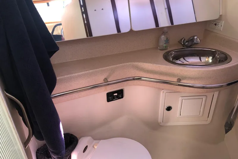 Slide: The Image of Bathroom interior of 2000 Catalina 470 yacht with sink and mirror. - 12