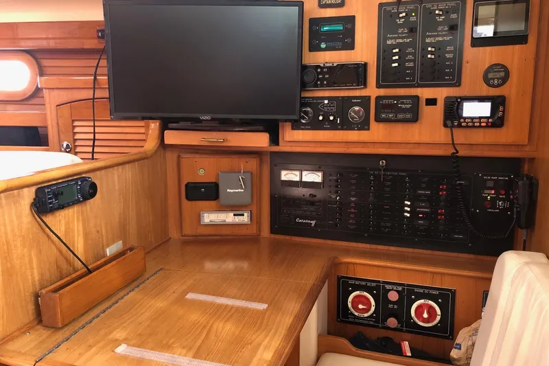 Slide: The Image of Control panel of a 2000 Catalina 470 yacht with navigation and communication equipment. - 5