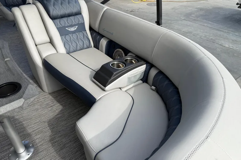 Slide: The Image of 2024 Bennington 23 RSB boat interior with luxurious seating and cup holders. - 10