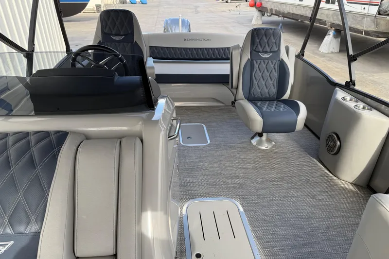Slide: The Image of 2024 Bennington 23 RSB boat interior with luxurious seating and modern design. - 11