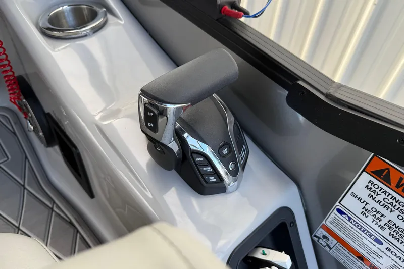 Slide: The Image of Control panel of 2024 Bennington 23 RSB boat with throttle and warning labels. - 14