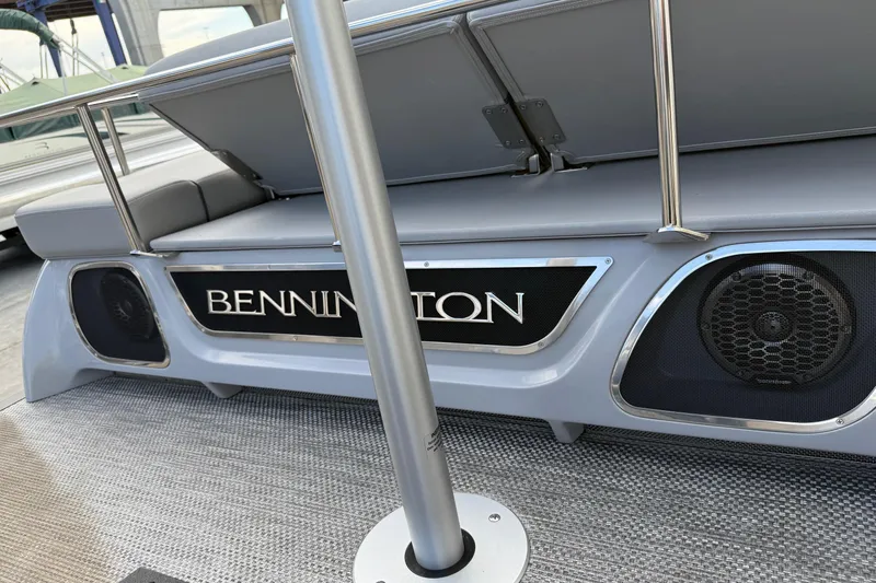 Slide: The Image of 2024 Bennington 23 RSB boat interior with speakers and seating. - 20