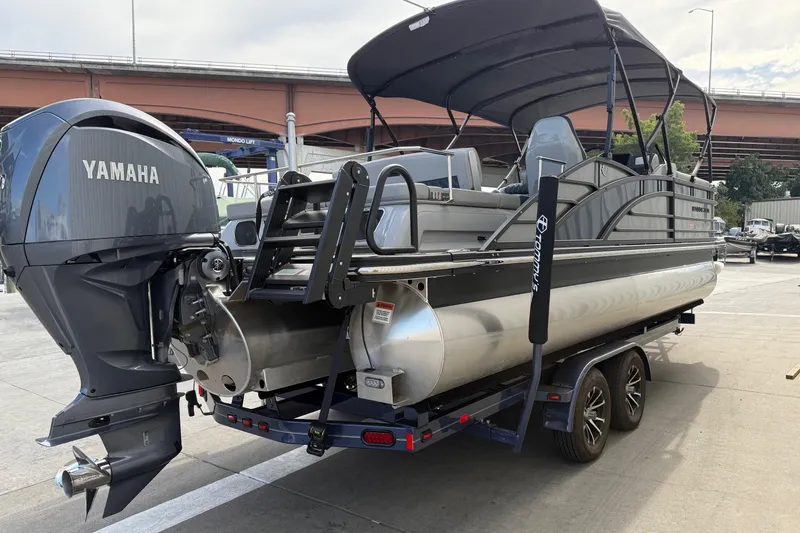 Slide: The Image of 2024 Bennington 23 RSB pontoon boat with Yamaha engine on trailer. - 5
