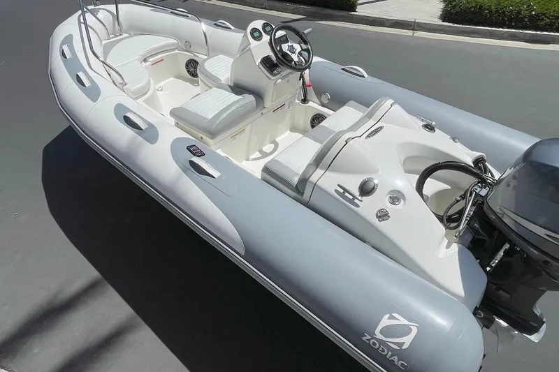 Slide: The Image of 2007 Zodiac Yachtline Deluxe 420 inflatable boat with sleek design and modern controls. - 13
