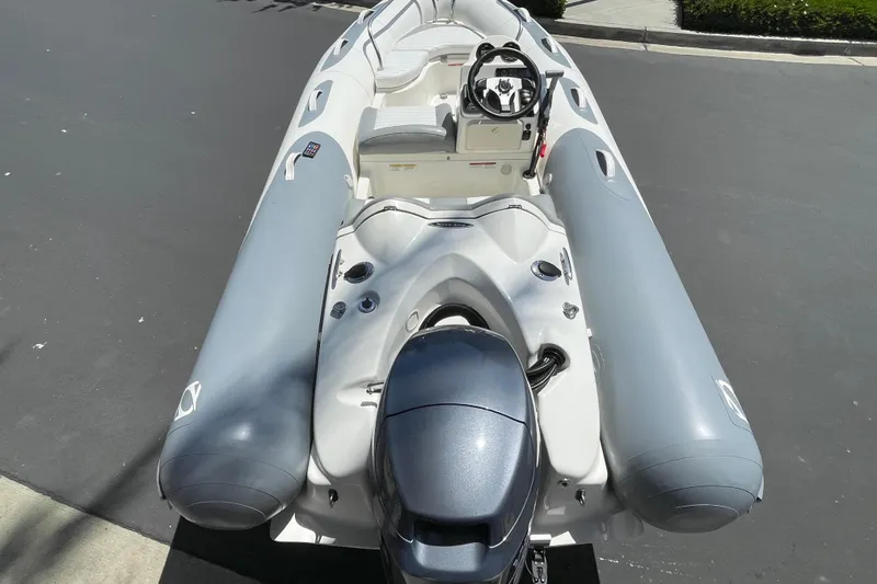 Slide: The Image of 2007 Zodiac Yachtline Deluxe 420 inflatable boat with outboard motor, viewed from above. - 15