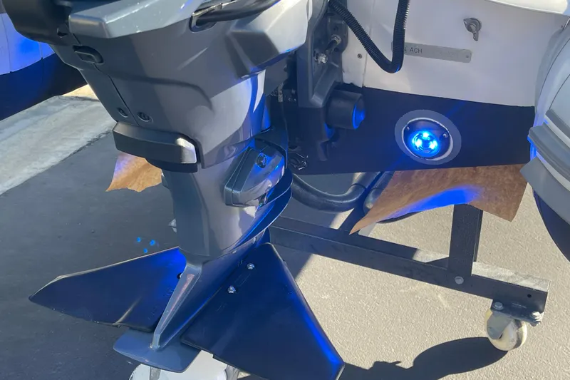 Slide: The Image of Close-up of Achilles HB-315DX 2020 boat motor with blue LED light. - 13