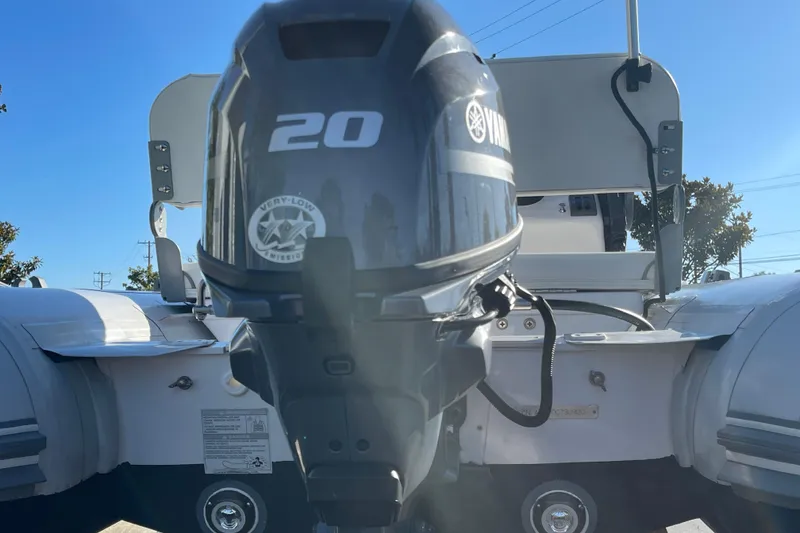 Slide: The Image of 2020 Achilles HB-315DX boat with Yamaha 20HP outboard motor, sunny day background. - 15
