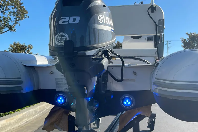 Slide: The Image of 2020 Achilles HB-315DX inflatable boat with Yamaha 20HP outboard motor, blue LED lights. - 18