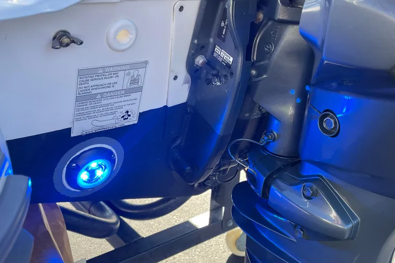 Slide: The Image of Close-up of Achilles HB-315DX boat engine with blue LED light, 2020 model. - 22