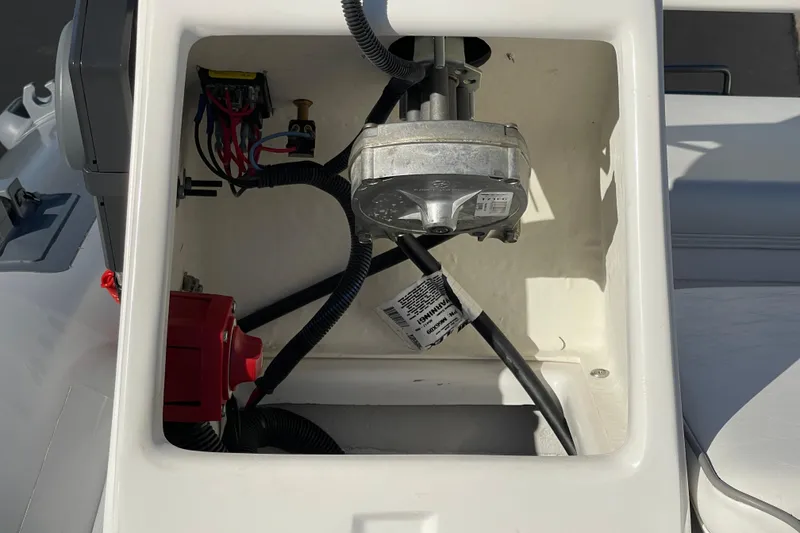 Slide: The Image of Interior view of Achilles HB-315DX boat, showcasing wiring and components, 2020 model. - 7