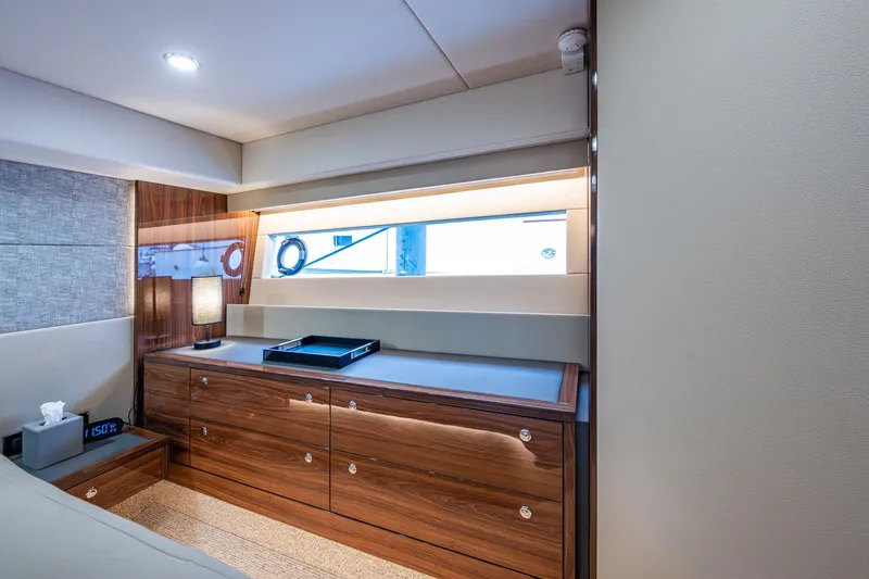 Slide: The Image of Luxurious interior of 2023 Maritimo M55 yacht with elegant wood cabinetry and modern lighting. - 102