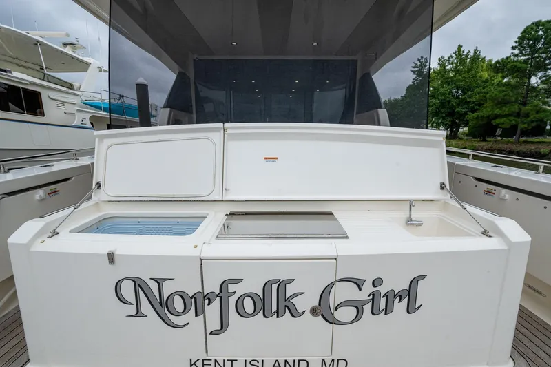 Slide: The Image of 2023 Maritimo M55 yacht with "Norfolk Girl" name, docked at Kent Island, MD. - 131