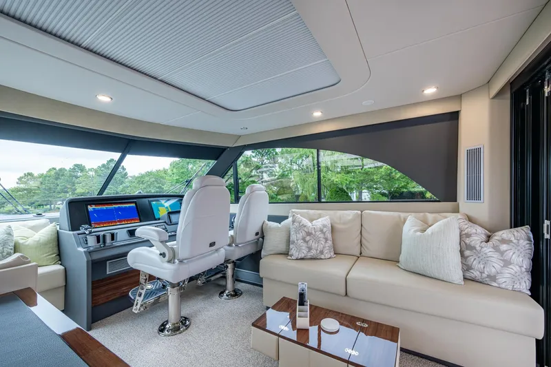 Slide: The Image of Luxurious interior of 2023 Maritimo M55 yacht with plush seating and modern helm. - 33