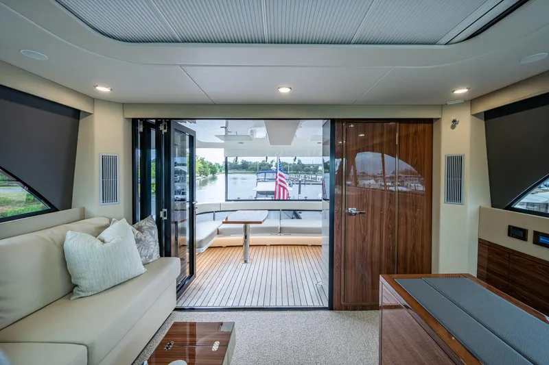Slide: The Image of Luxurious interior of 2023 Maritimo M55 yacht with elegant seating and outdoor view. - 42