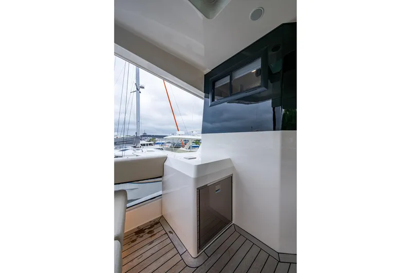 Slide: The Image of 2023 Maritimo M55 yacht deck with sleek design and modern amenities. - 48