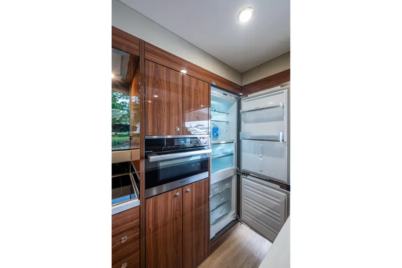 Slide: The Image of Luxurious kitchen interior of 2023 Maritimo M55 yacht with modern appliances. - 59
