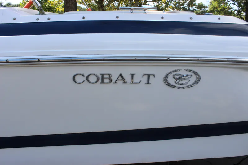 Slide: The Image of 2006 Cobalt 246 boat side view with logo and emblem. - 25