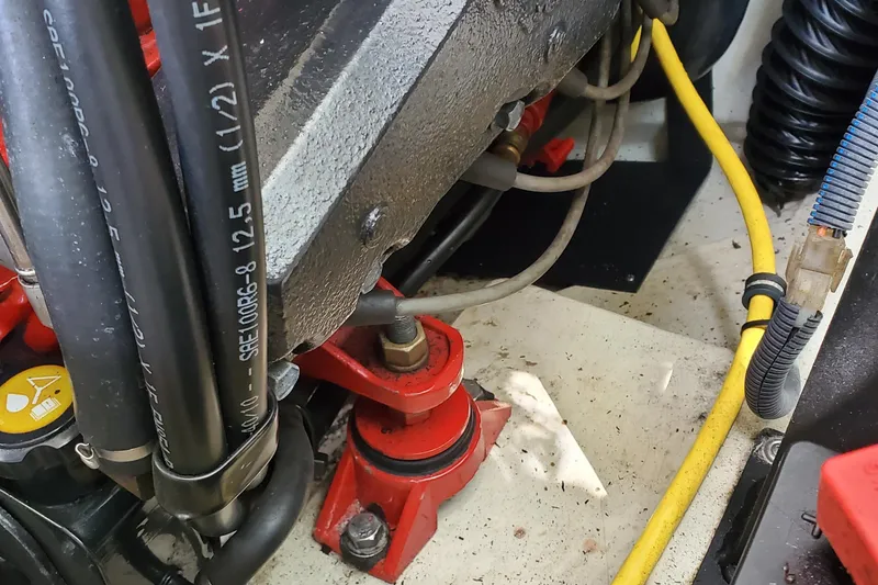 Slide: The Image of Engine compartment of a 2006 Cobalt 246 boat, showing hoses and wiring. - 45