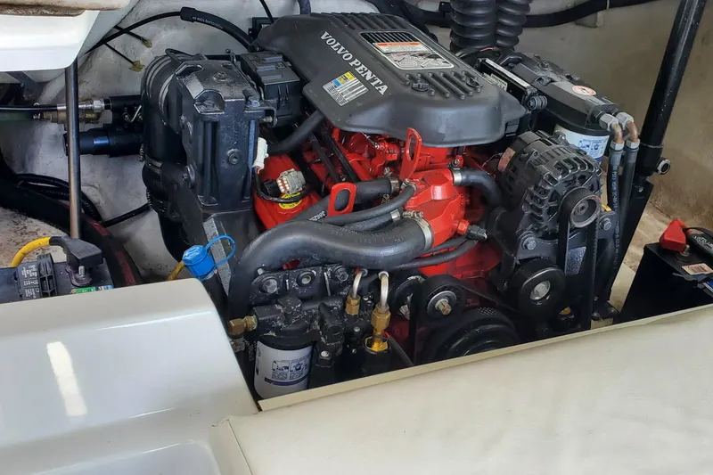 Slide: The Image of 2006 Cobalt 246 boat engine compartment with Volvo Penta engine. - 47