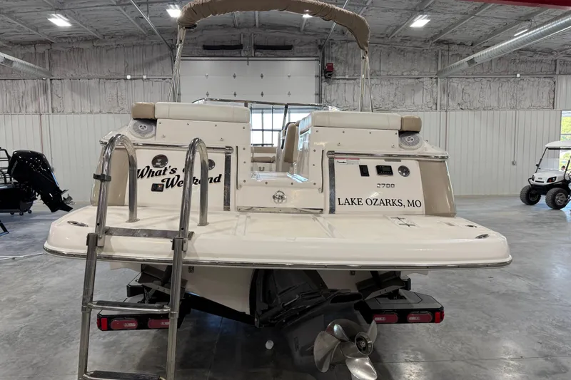 Slide: The Image of 2012 Regal 2700 Bowrider boat in a garage, Lake Ozarks, MO. - 5