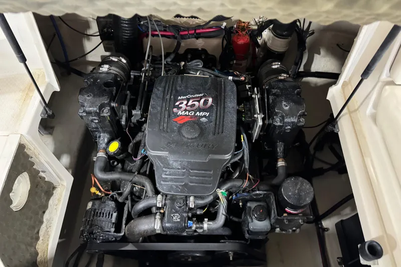 Slide: The Image of Engine compartment of a 2005 Sea Ray 240 Sundeck with MerCruiser 350 MAG MPI engine. - 11