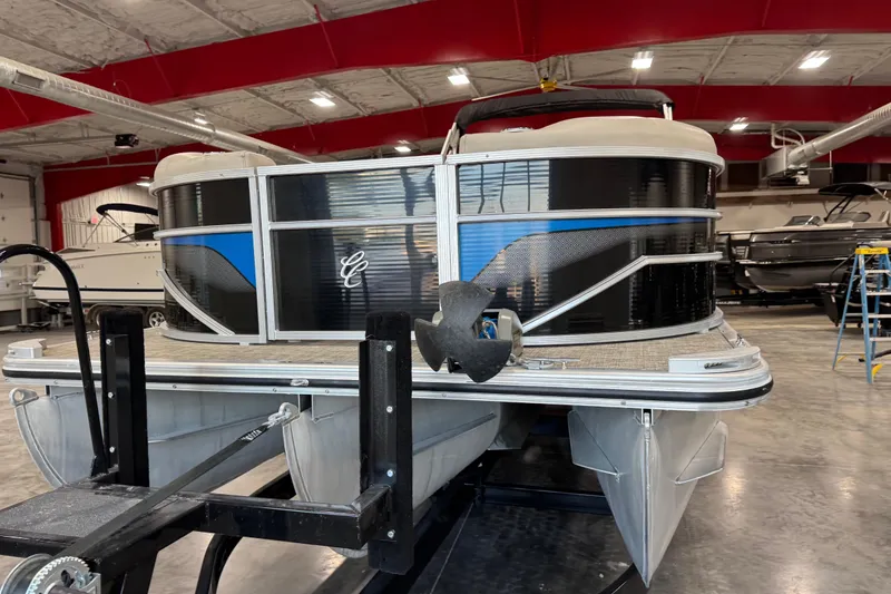 Slide: The Image of 2017 Cypress Cay Seabreeze 253 pontoon boat in a showroom, front view. - 5